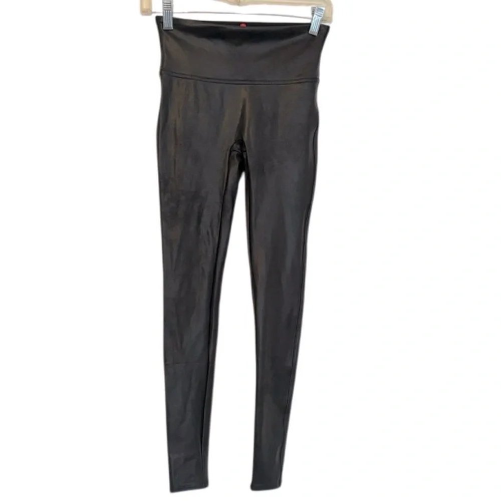 Spanx Women’s Black Faux Leather Leggings in a size Small.